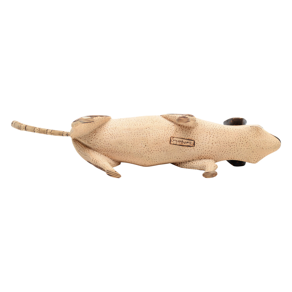 This whimsical folk art dog sculpture