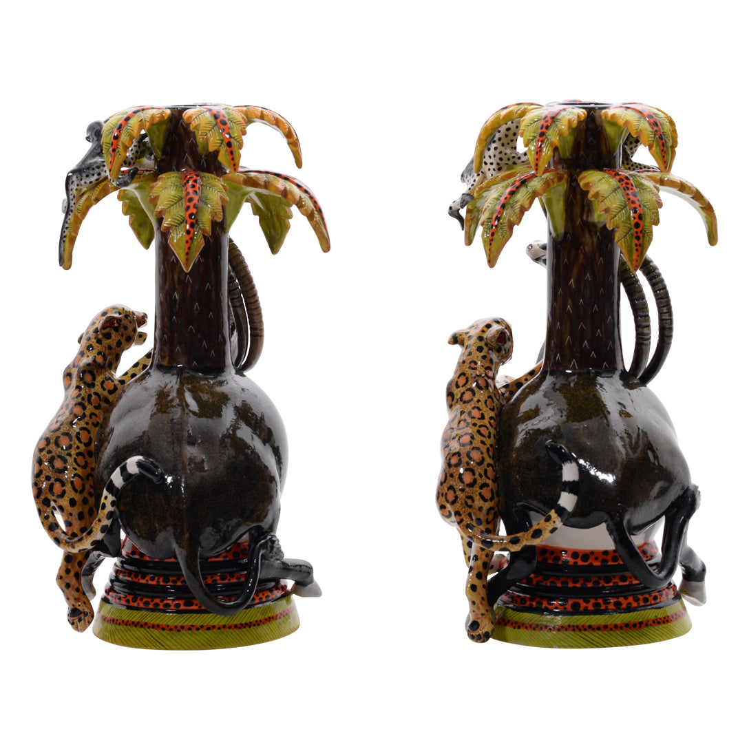 Pair of sable & leopard candlestics