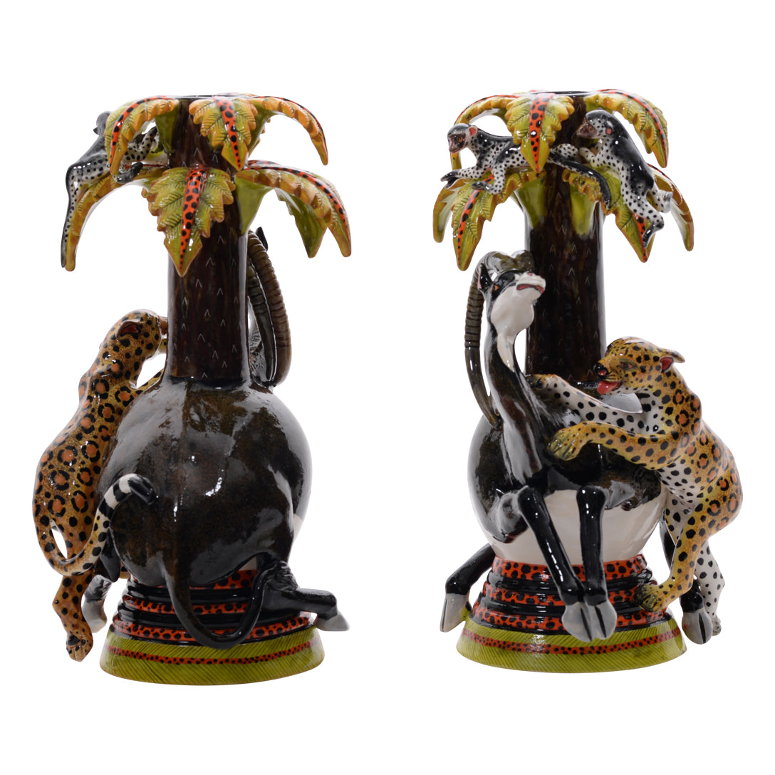 Pair of sable & leopard candlestics