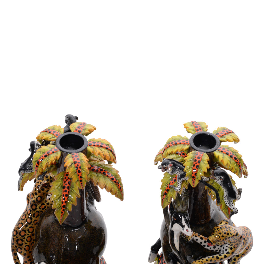 Pair of sable & leopard candlestics