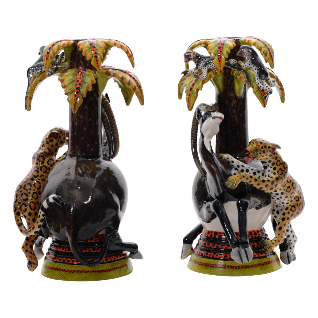 Pair of sable & leopard candlestics