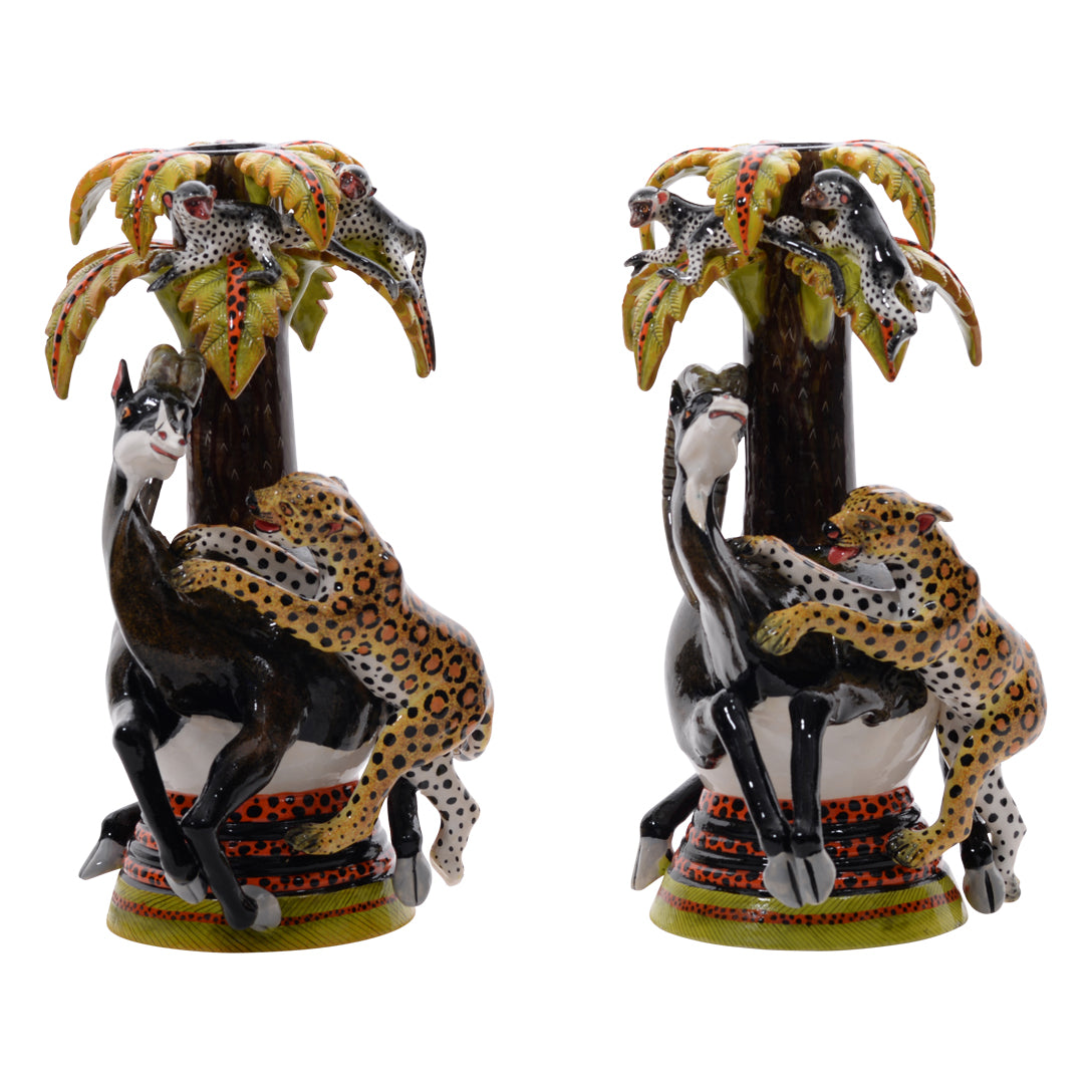 Pair of sable & leopard candlestics