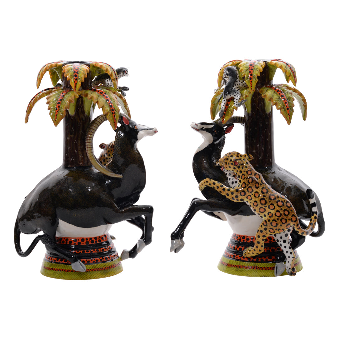 Pair of sable & leopard candlestics