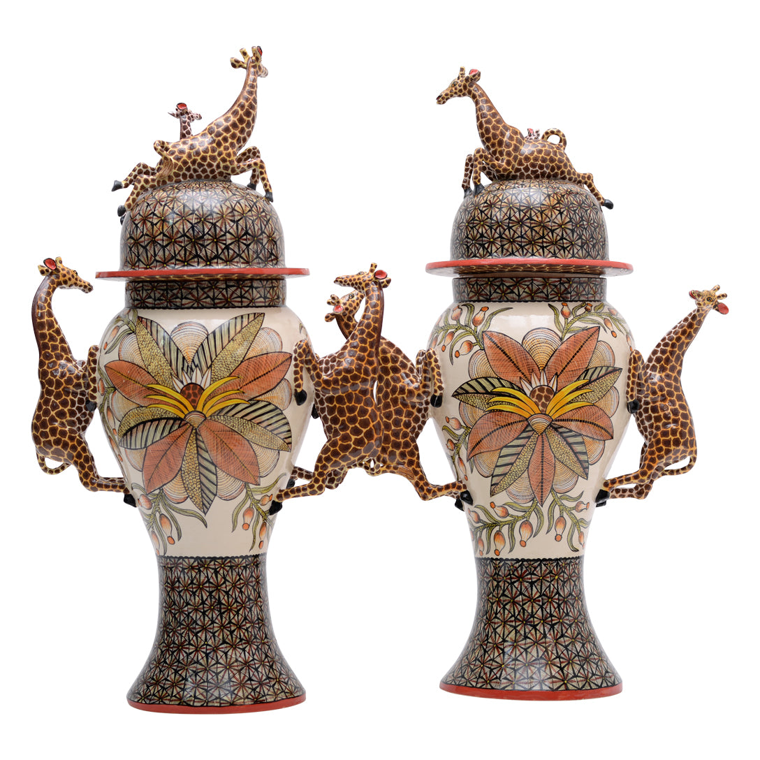 Pair of giraffe urns
