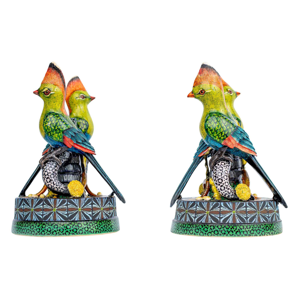 Pair of turaco candlesticks