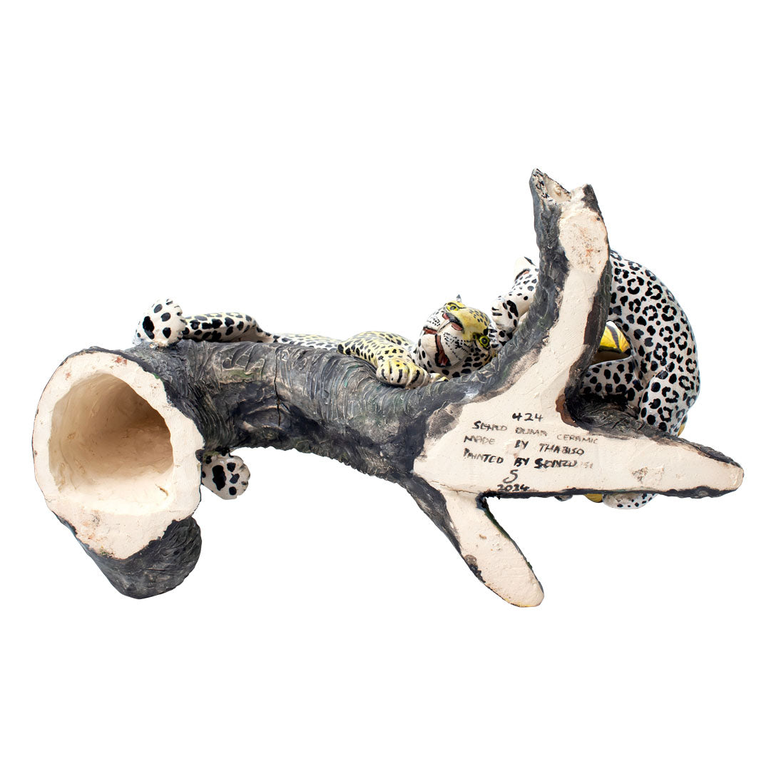 Pair of leopard & monkey candlesticks