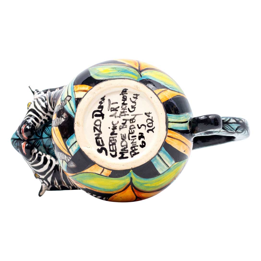 Zebra,protea,grass, blue, gold, black jug