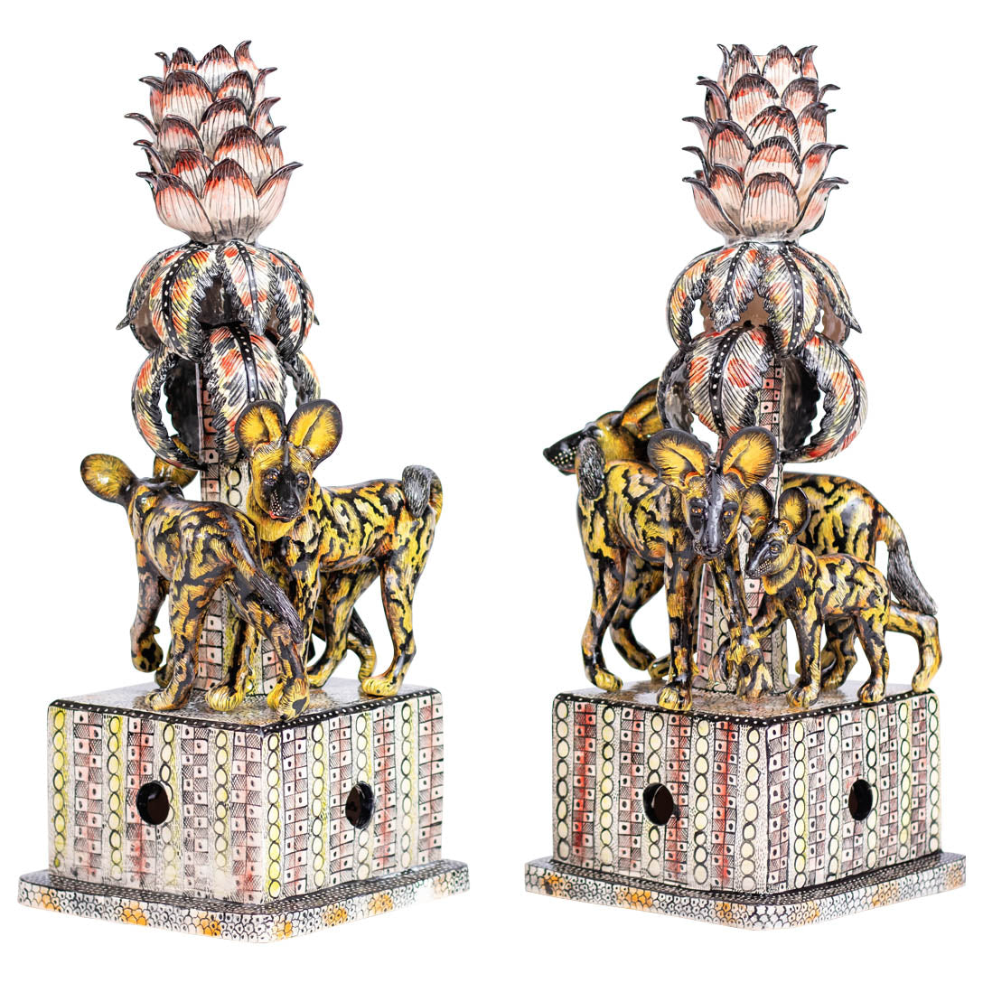 Pair of wild dog candlesticks