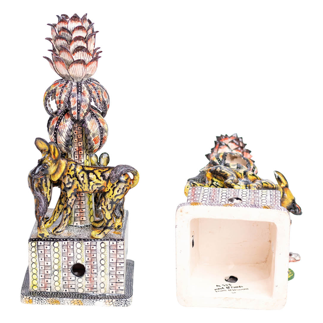 Pair of wild dog candlesticks