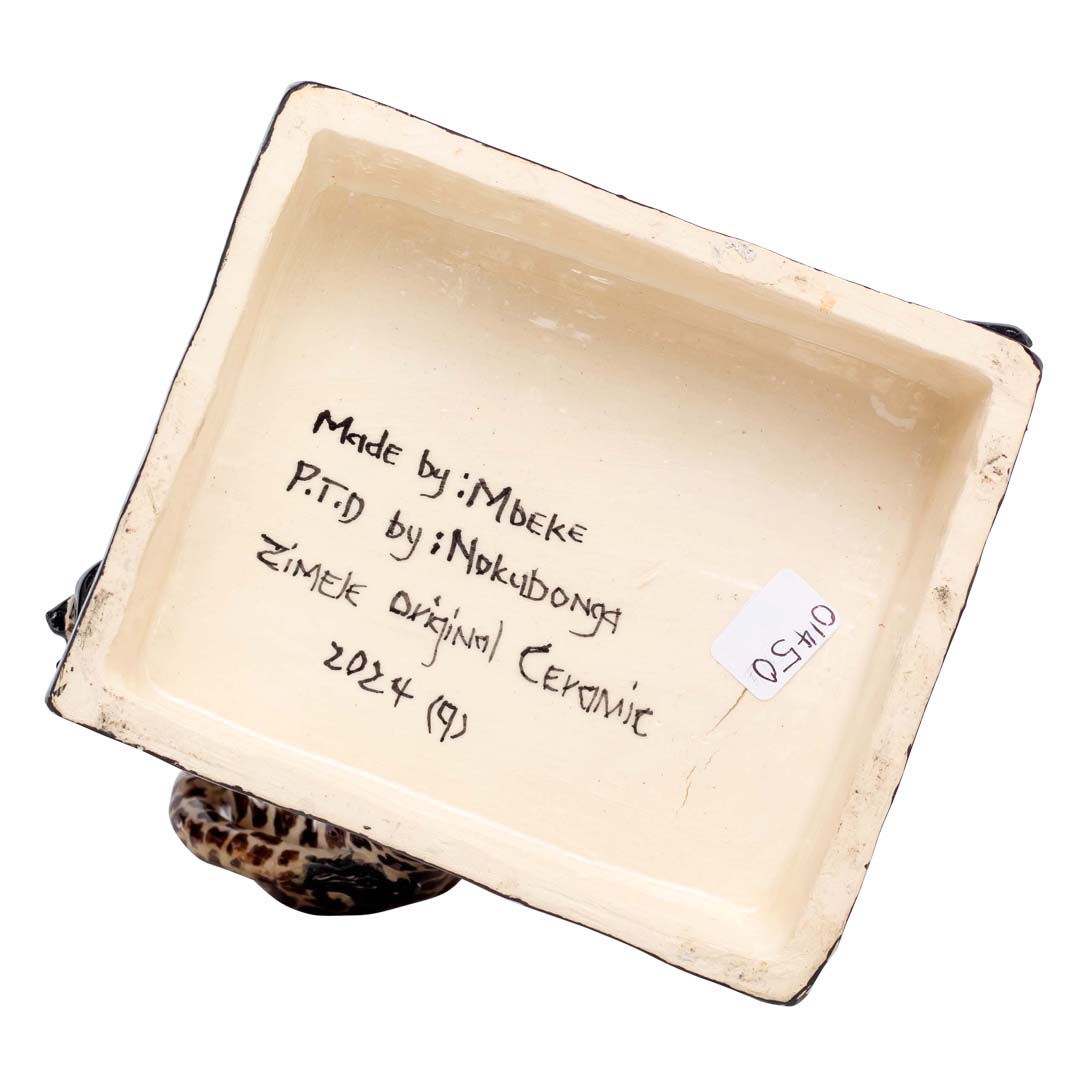 Giraffe & bird rider sculpture