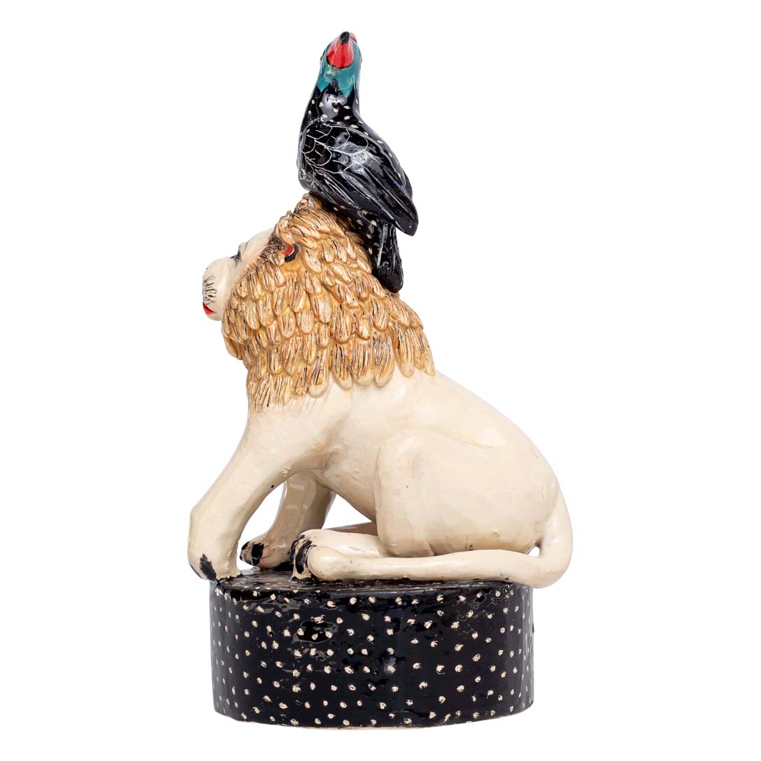 White lion & guineafowl rider sculpture