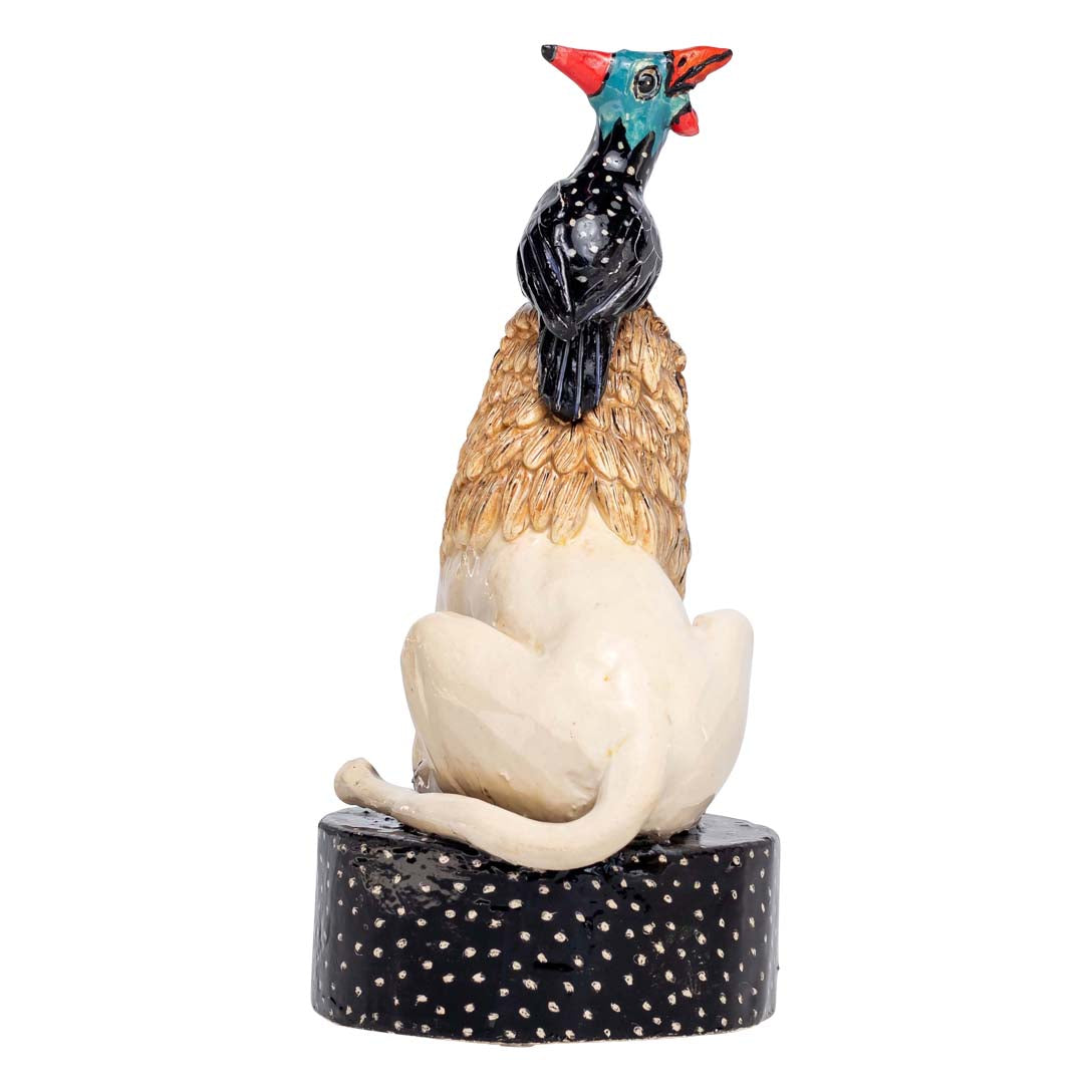 White lion & guineafowl rider sculpture