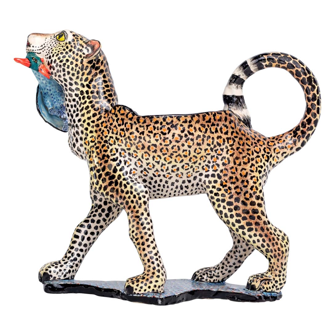 Leopard with a guineafowl peanut bowl