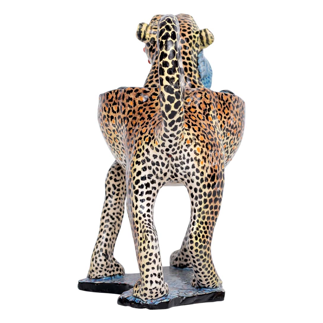 Leopard with a guineafowl peanut bowl