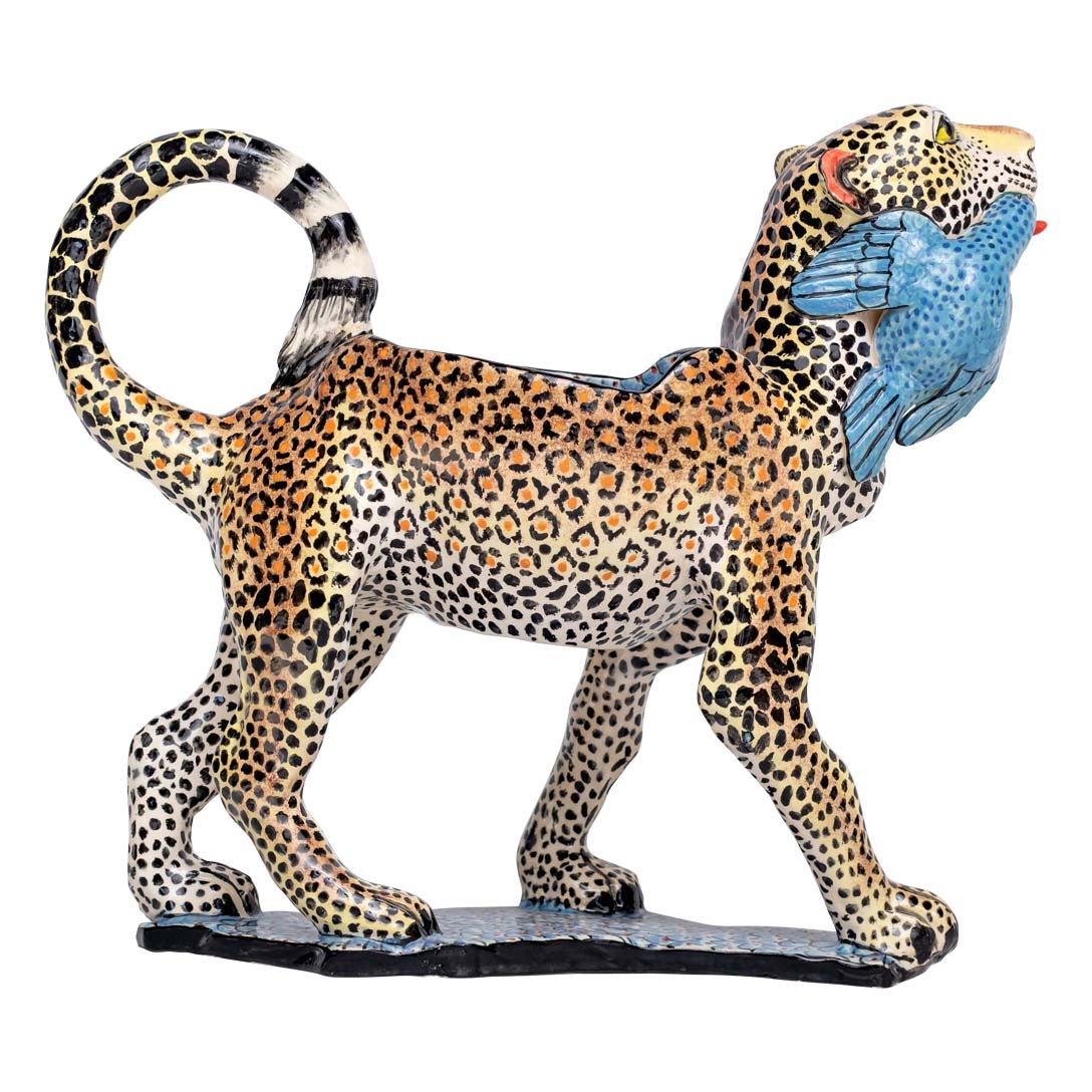 Leopard with a guineafowl peanut bowl