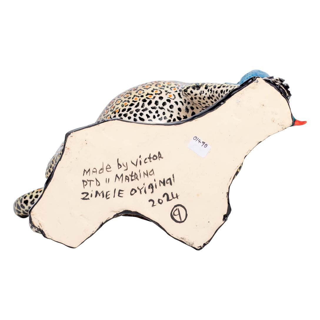 Leopard with a guineafowl peanut bowl
