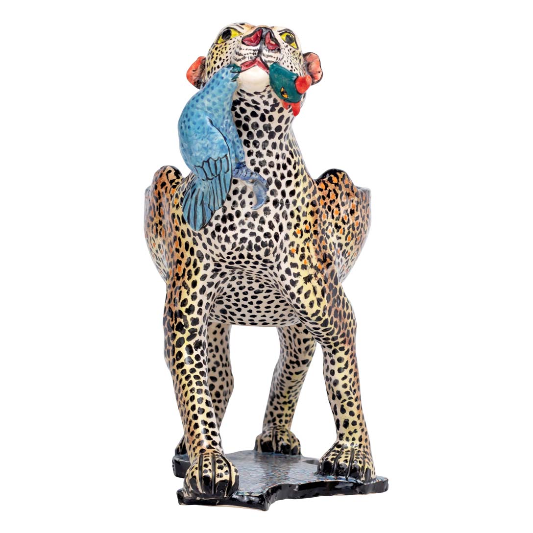 Leopard with a guineafowl peanut bowl