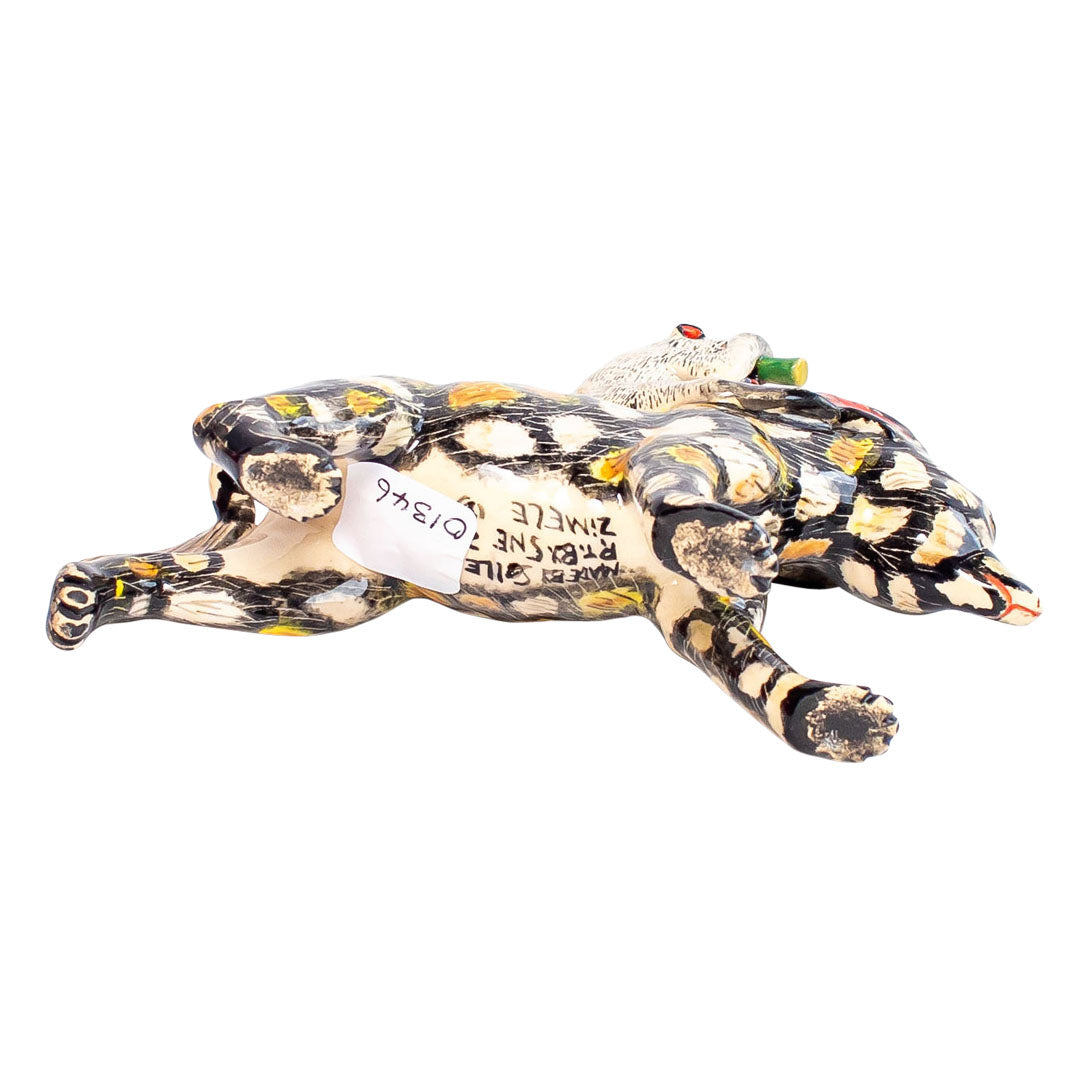 Wild dog monkey rider sculpture