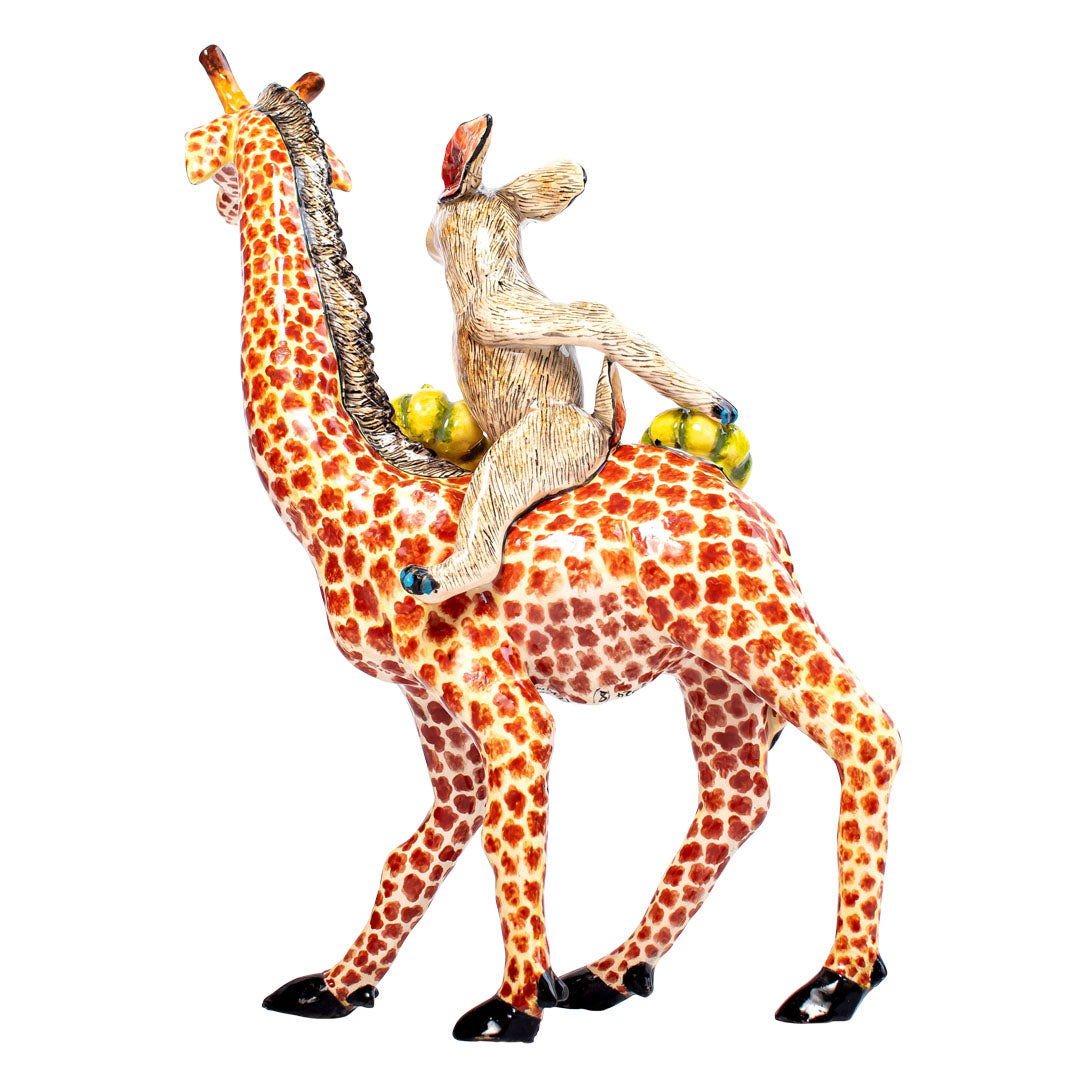 Giraffe rabbit pumpkins rider sculpture