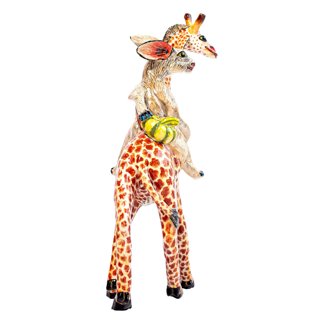 Giraffe rabbit pumpkins rider sculpture