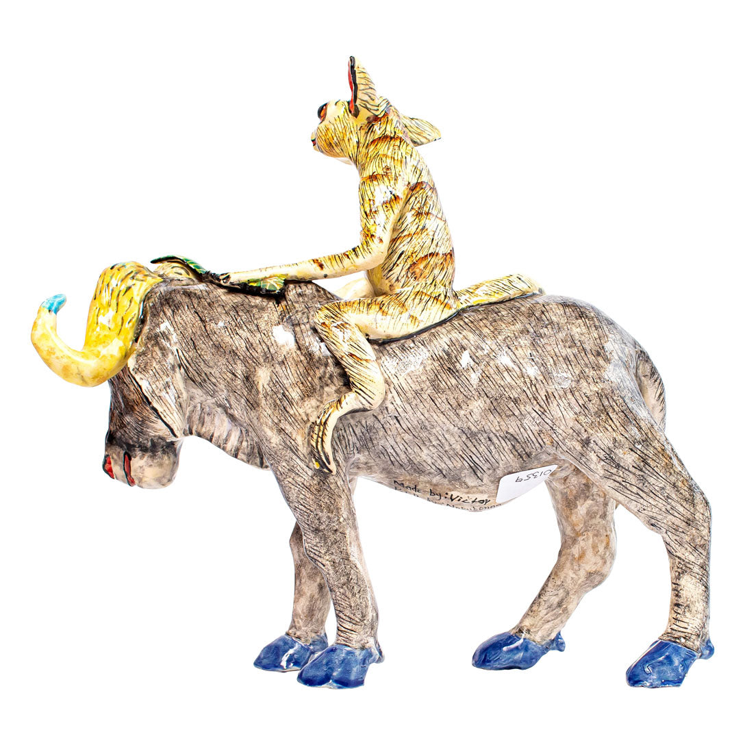 Buffalo bush baby rider sculpture