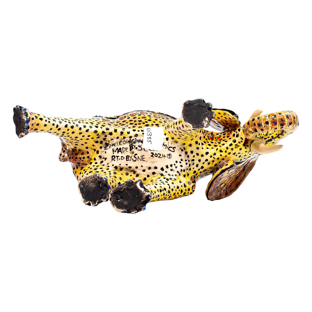 Royal elephant with leopard skin rider sculpture