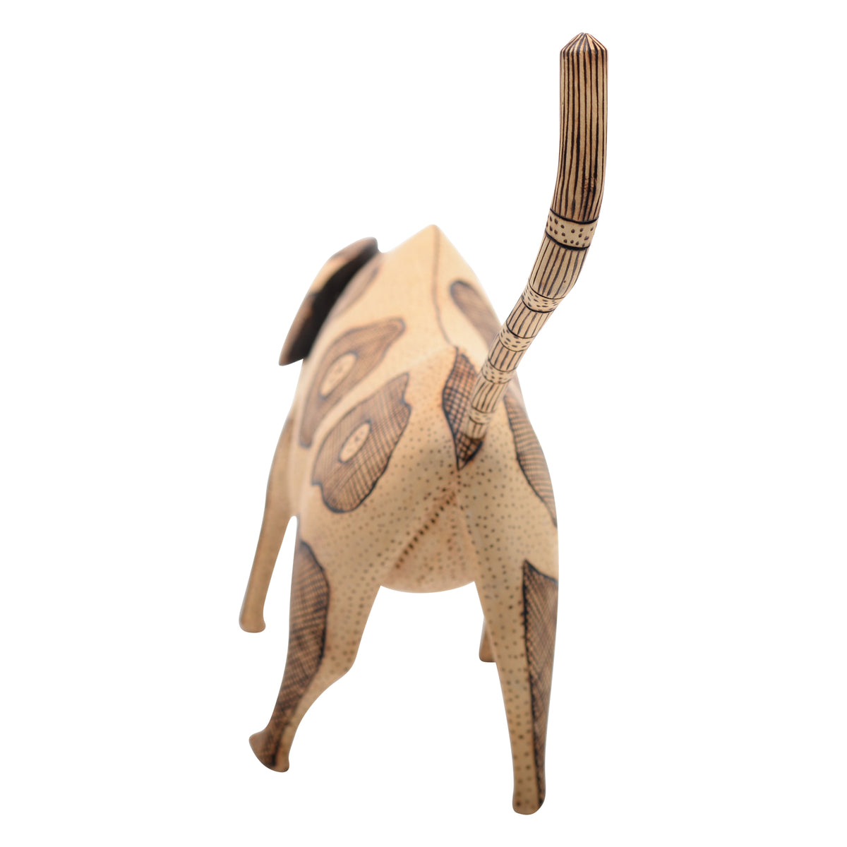 This whimsical folk art dog sculpture