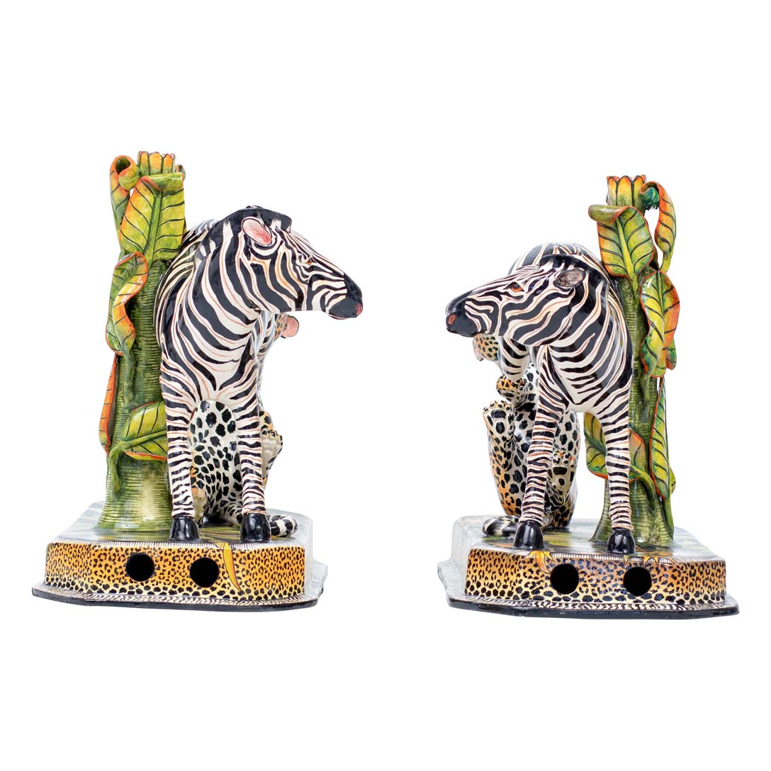 Pair of zebra & leopard candlesticks