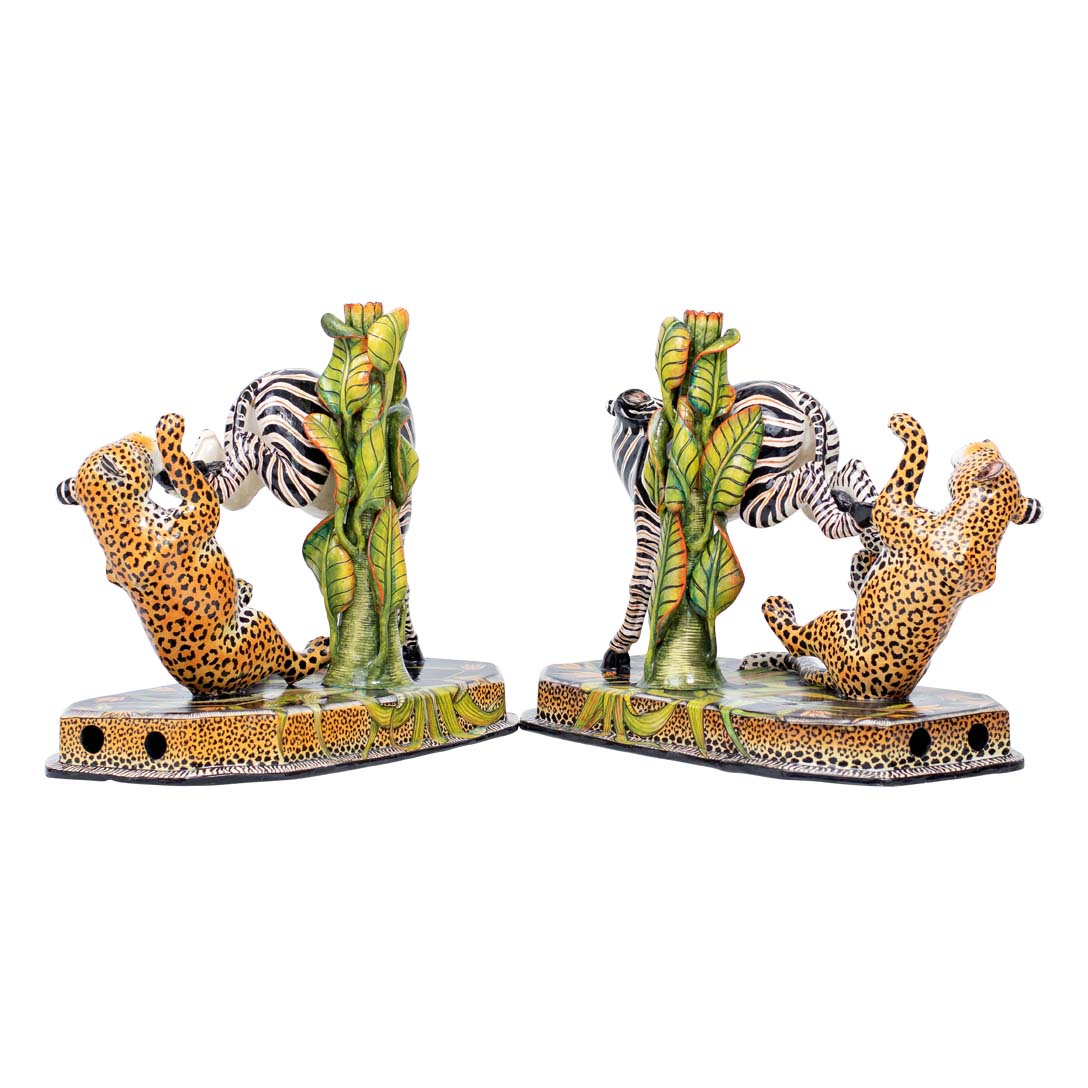 Pair of zebra & leopard candlesticks