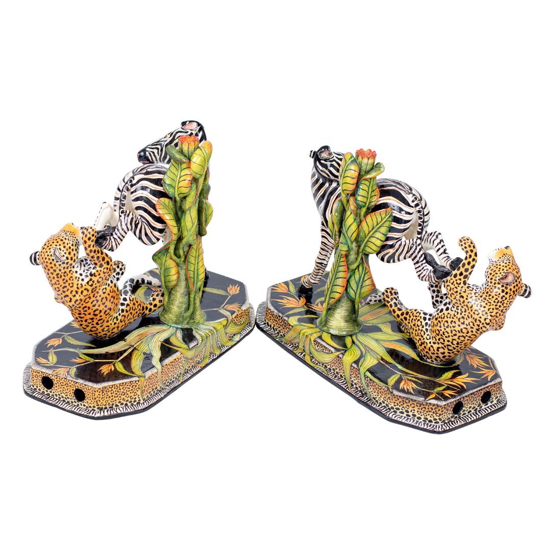 Pair of zebra & leopard candlesticks