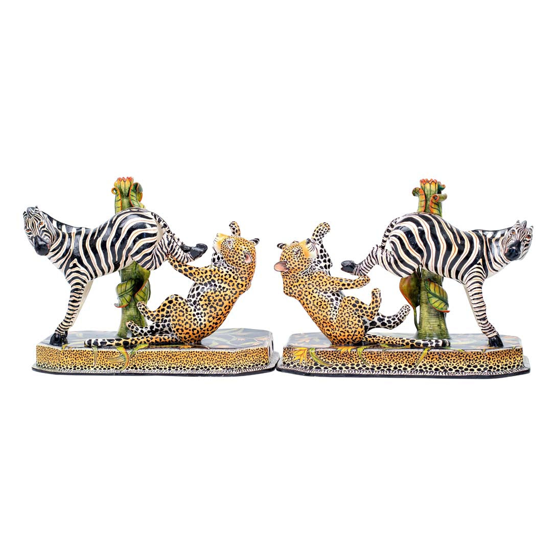 Pair of zebra & leopard candlesticks