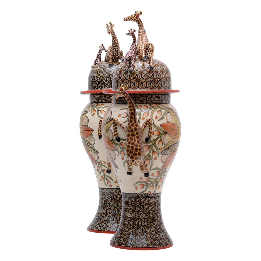 Pair of giraffe urns
