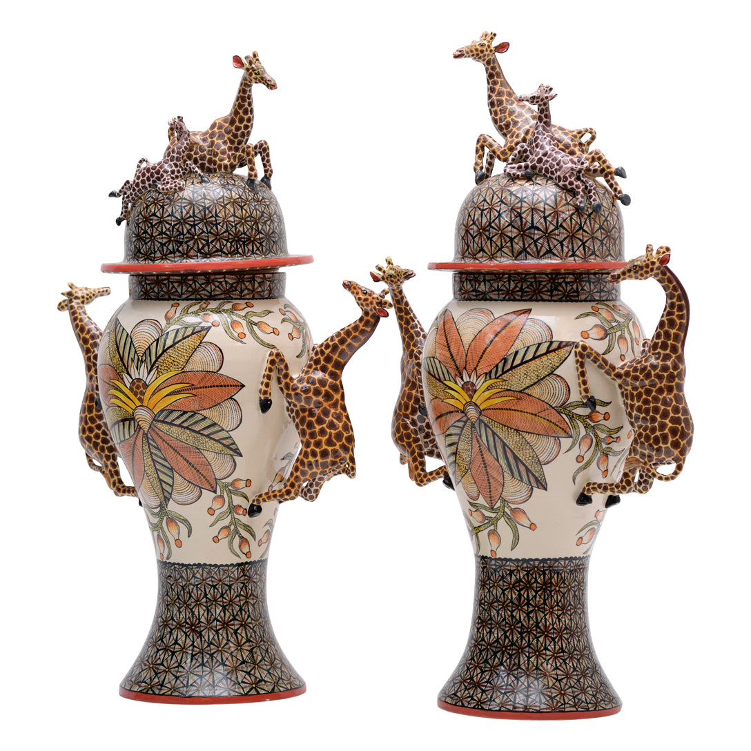 Pair of giraffe urns