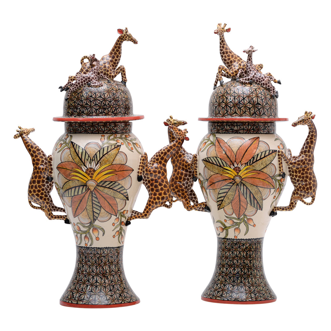 Pair of giraffe urns