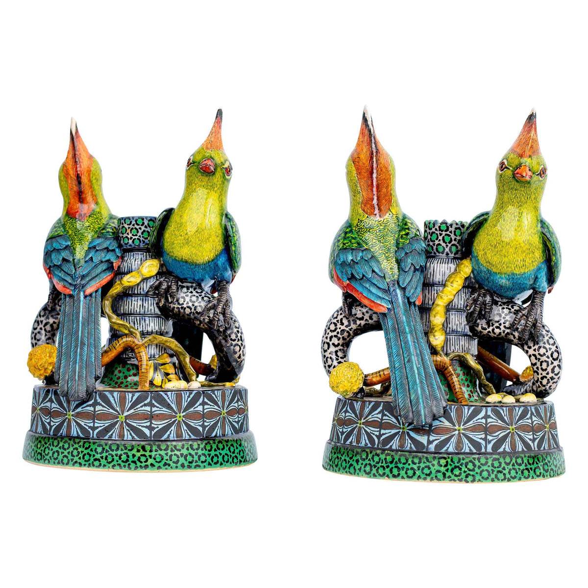 Pair of turaco candlesticks