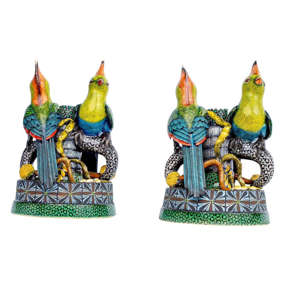 Pair of turaco candlesticks