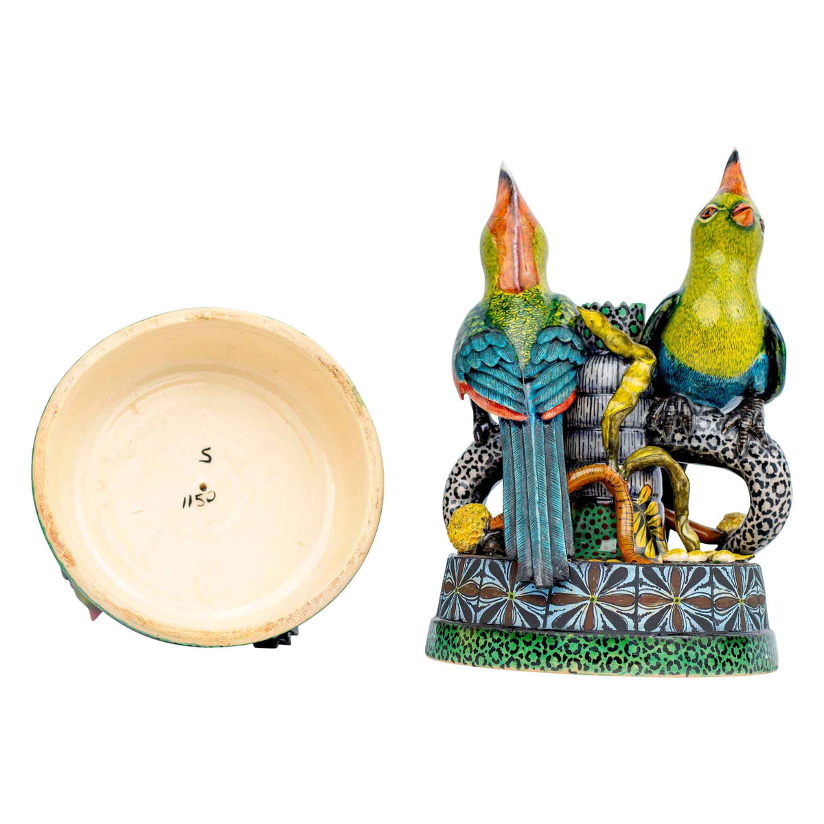 Pair of turaco candlesticks