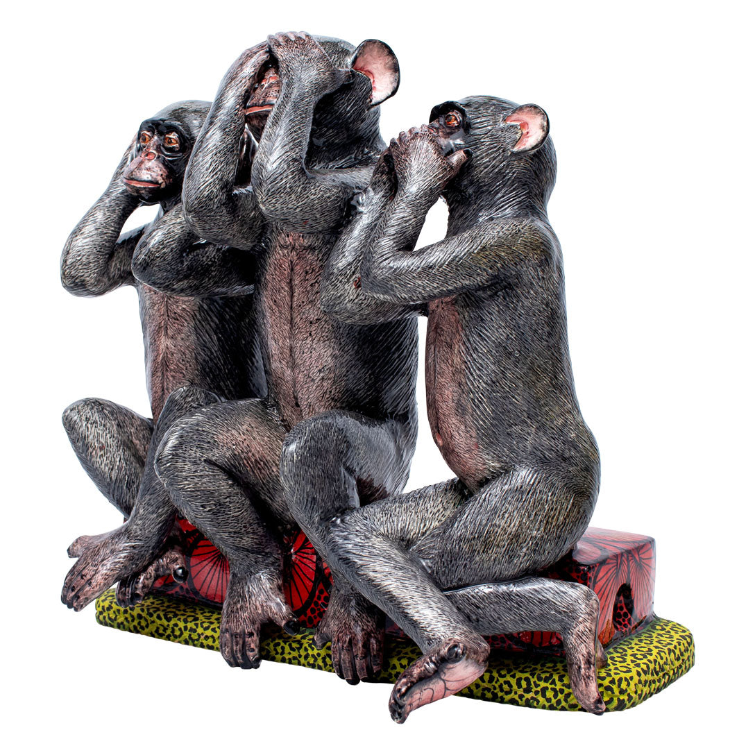 Three monkeys sculpture