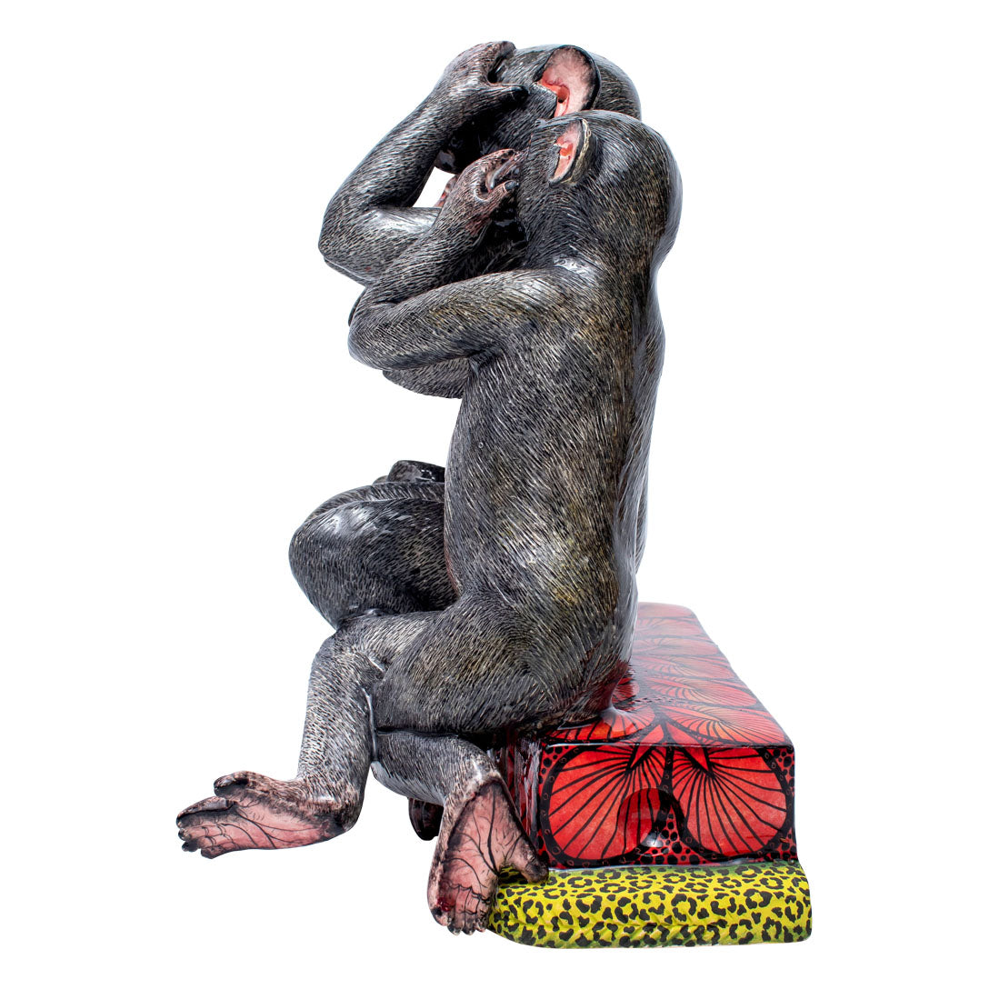 Three monkeys sculpture