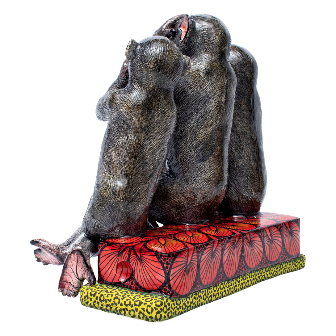 Three monkeys sculpture