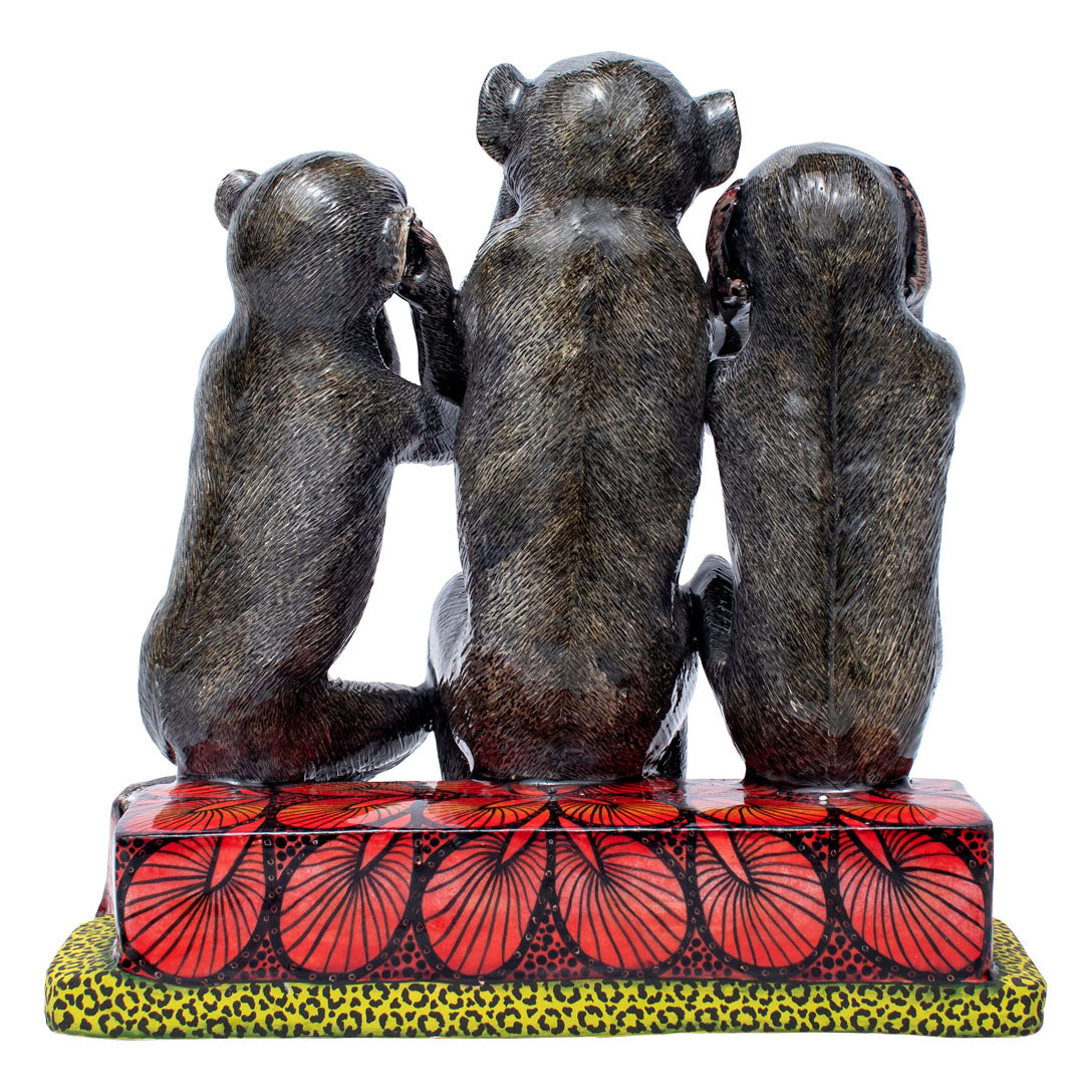 Three monkeys sculpture