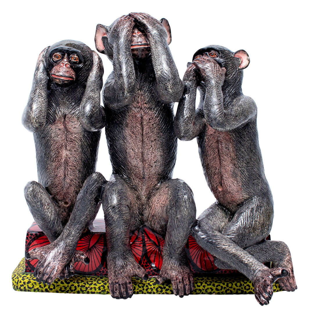 Three monkeys sculpture