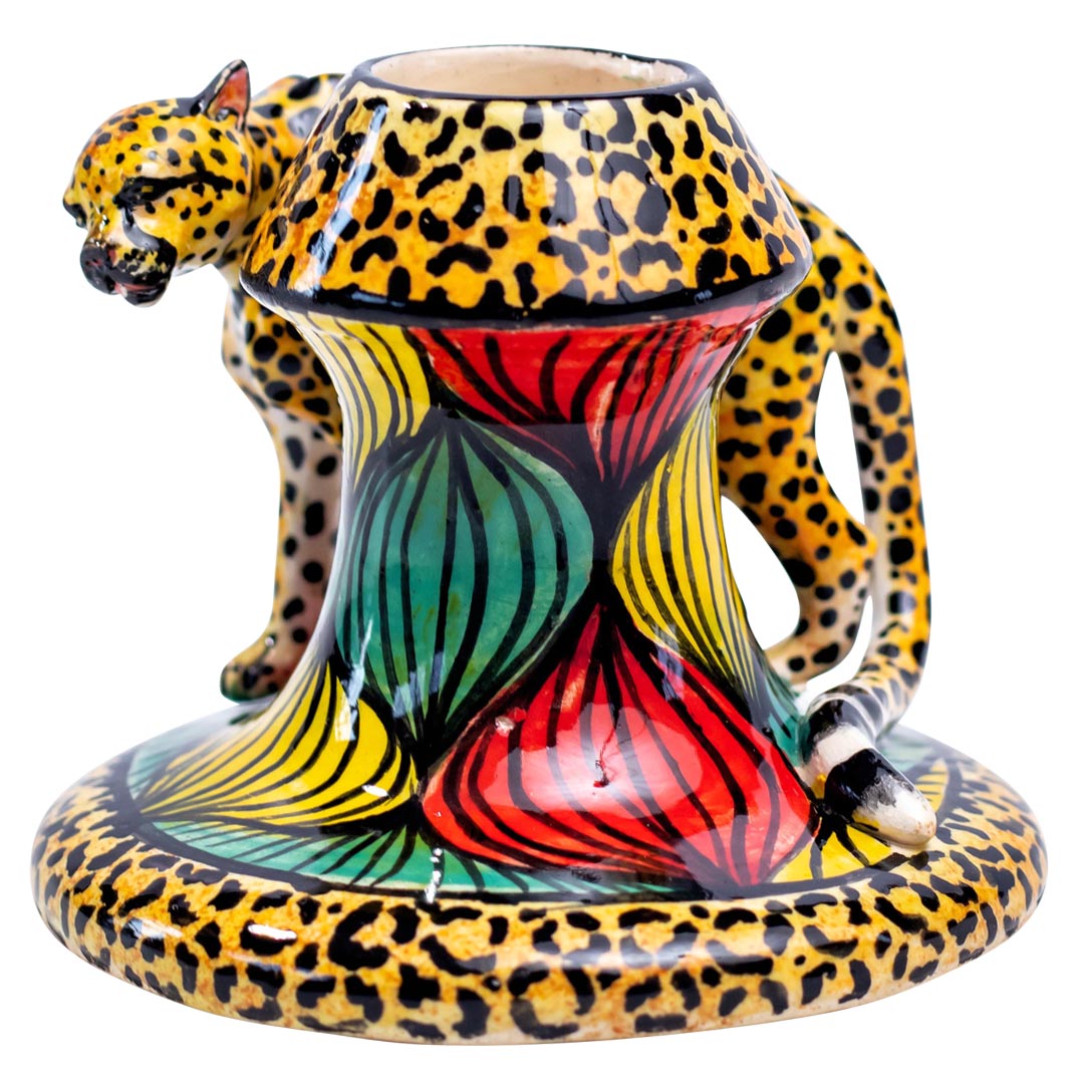 Pair of cheetah candlesticks