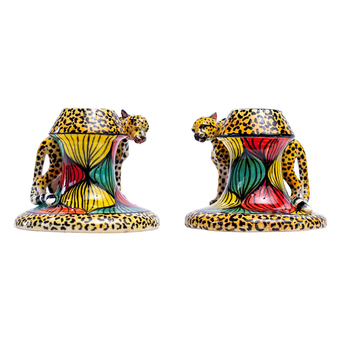 Pair of cheetah candlesticks