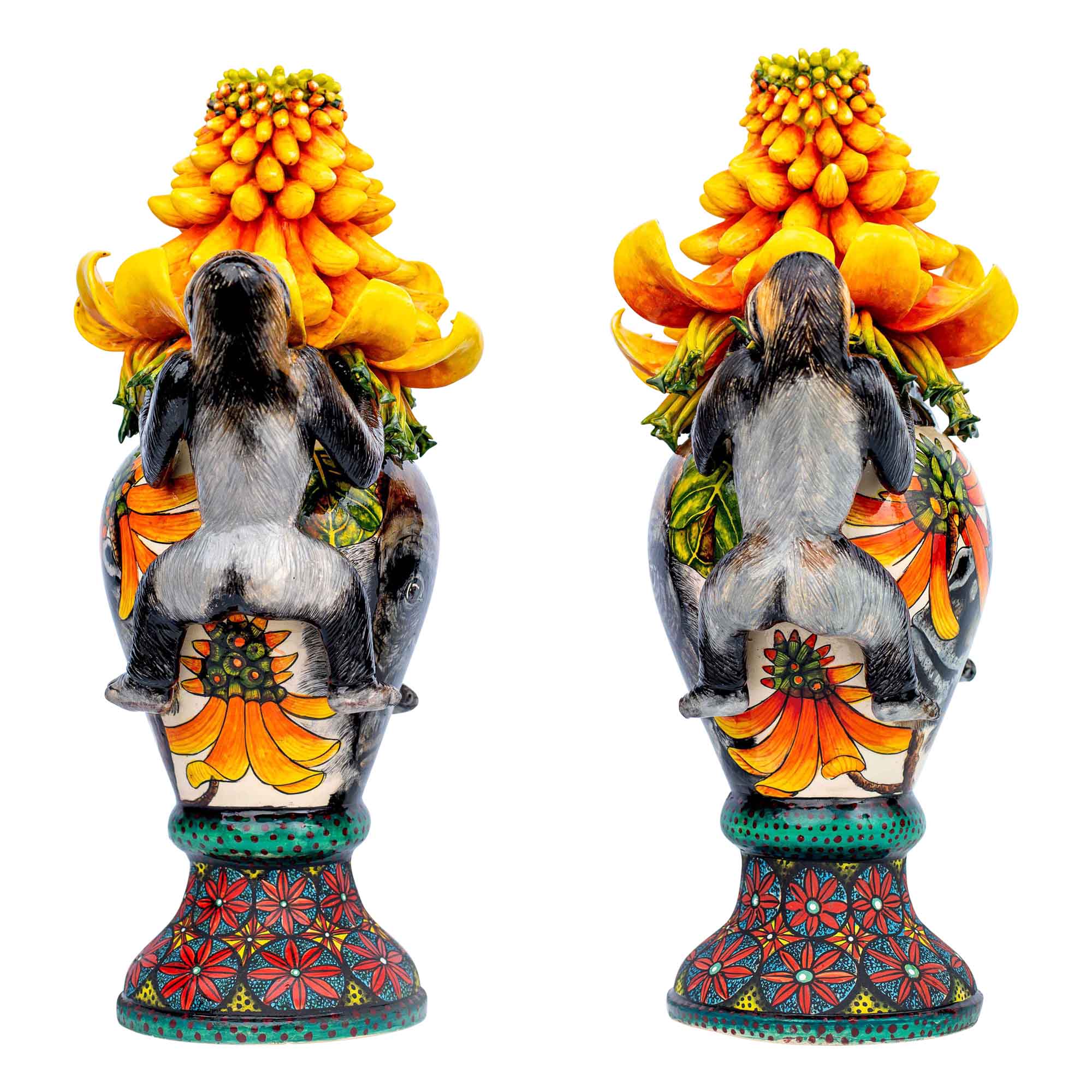 Pair of gorilla & aloe candlesticks