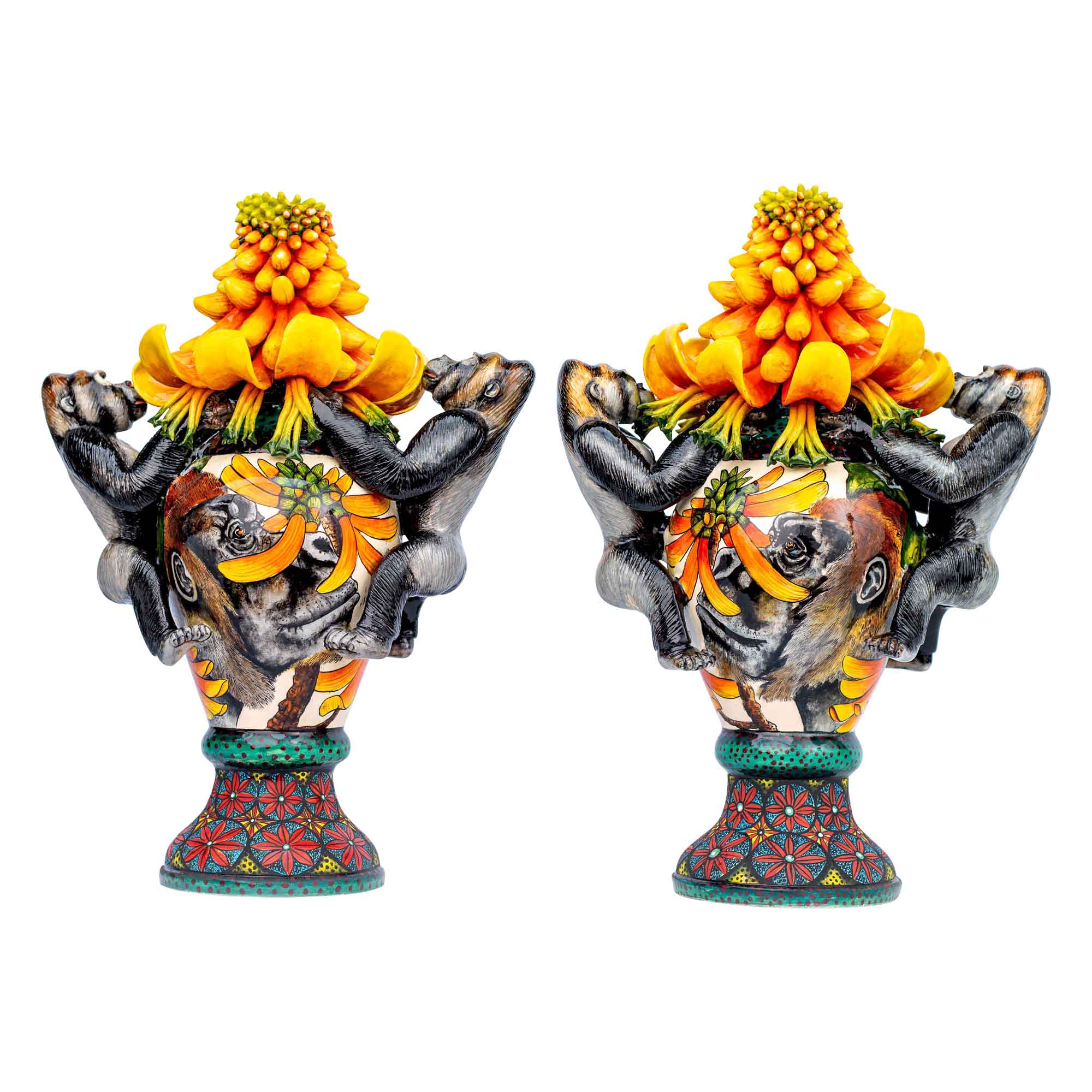 Pair of gorilla & aloe candlesticks
