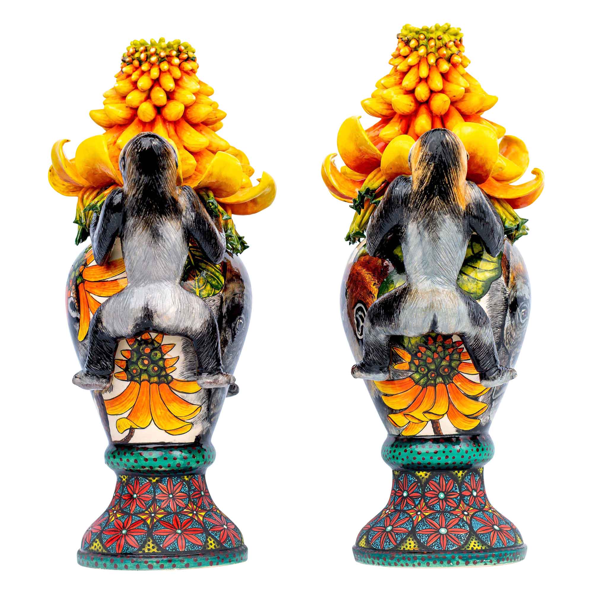Pair of gorilla & aloe candlesticks