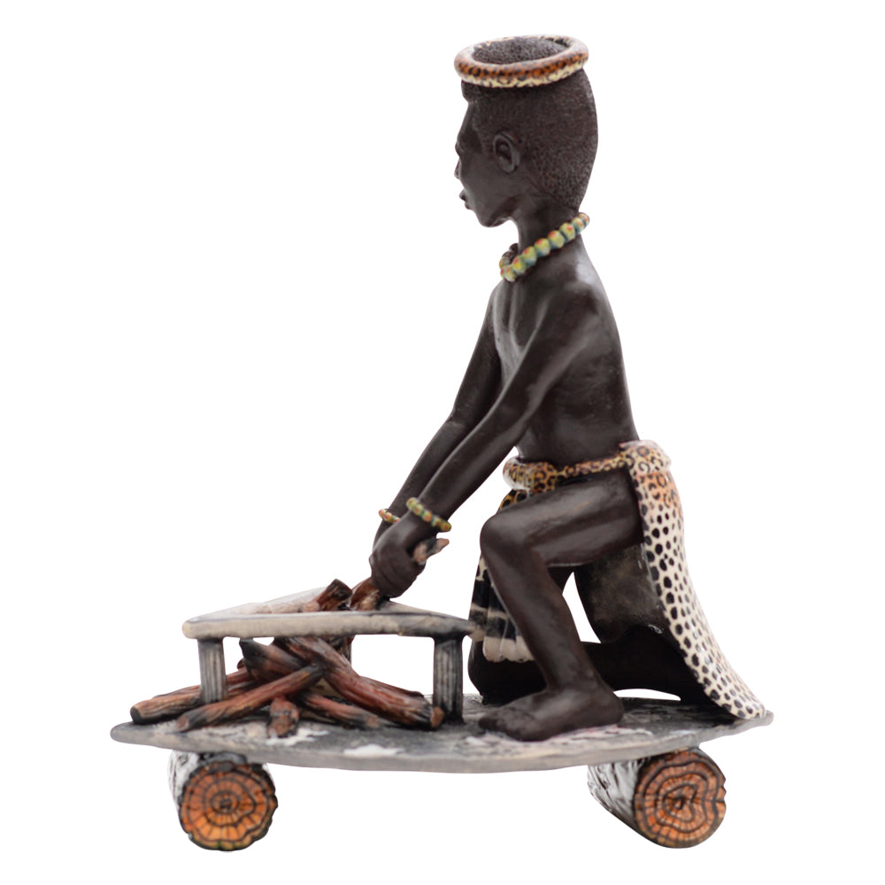 Man making fire sculpture