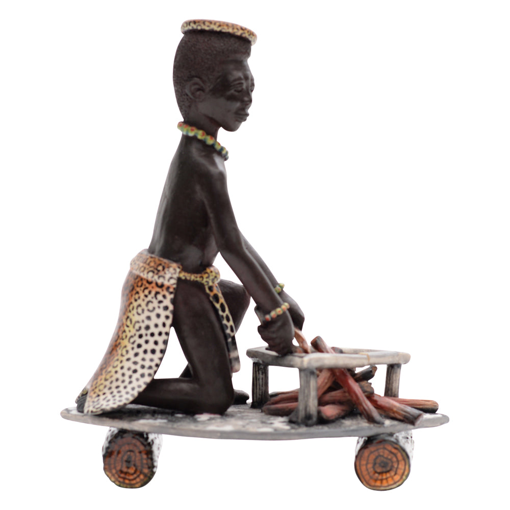 Man making fire sculpture