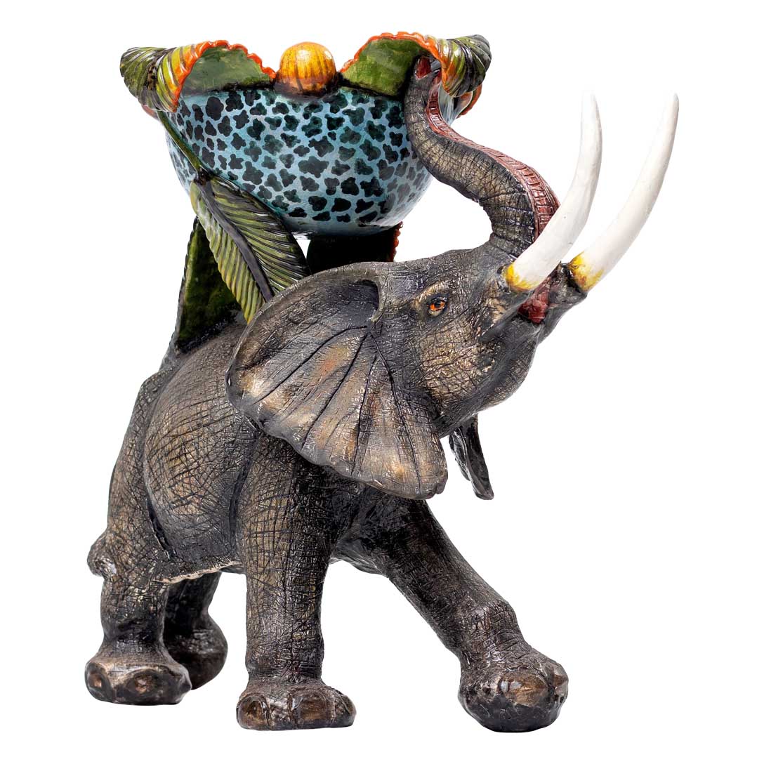 Elephant fruit hunting carrying sweet dish